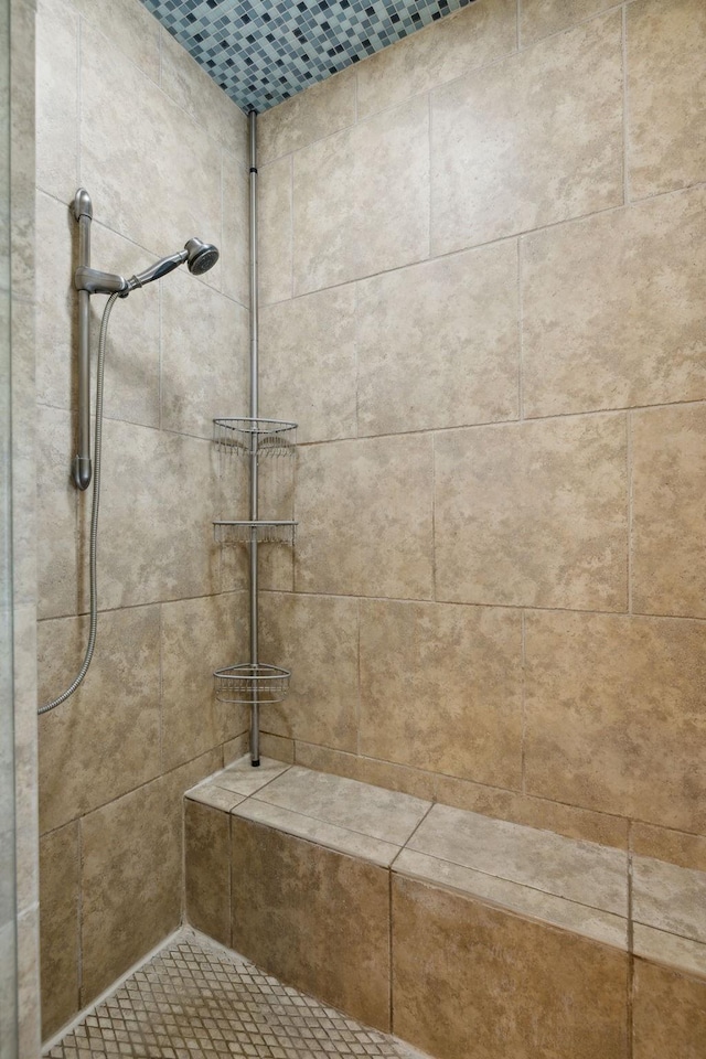 details featuring a tile shower