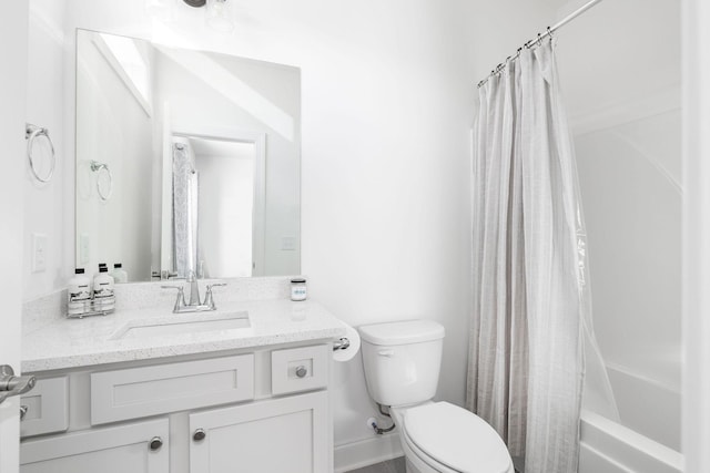 full bath with toilet, shower / bath combo with shower curtain, and vanity