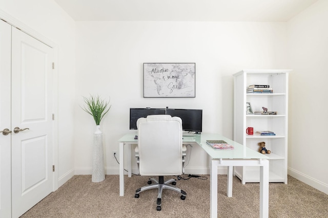 office with carpet and baseboards