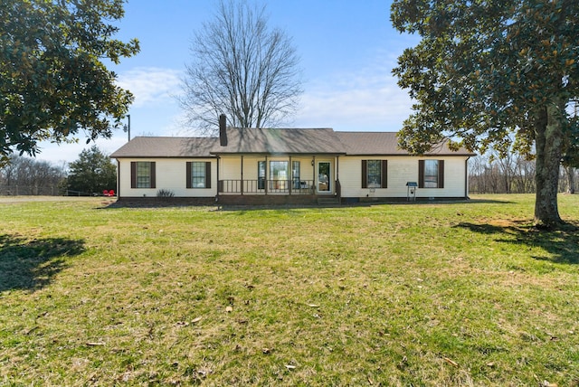 ranch-style house with a front yard