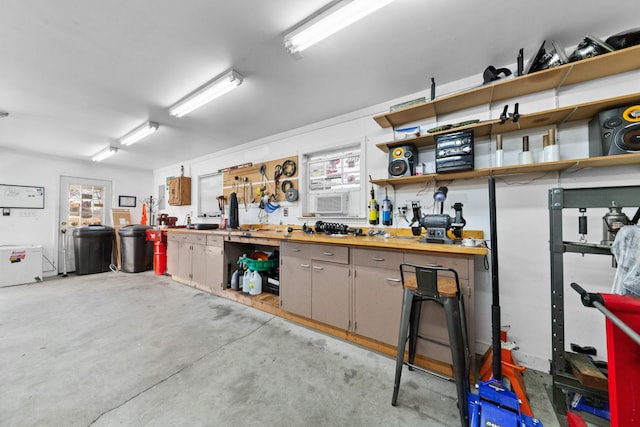 garage with a workshop area