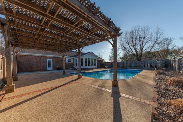 view of swimming pool with a fenced in pool, a fenced backyard, a patio, and a pergola