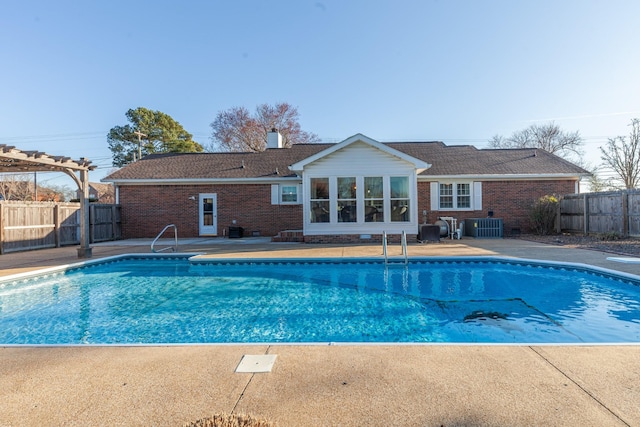 view of pool with a fenced in pool, a patio, central air condition unit, fence, and a pergola