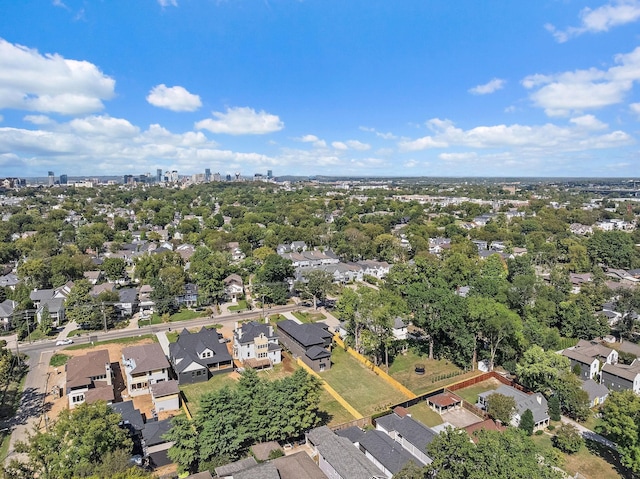 birds eye view of property with a residential view