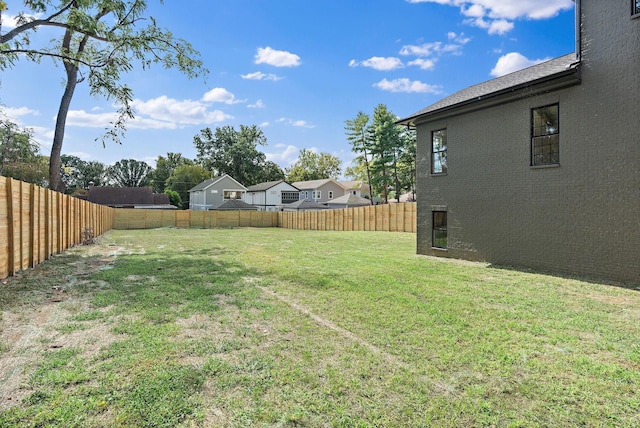 view of yard featuring a fenced backyard