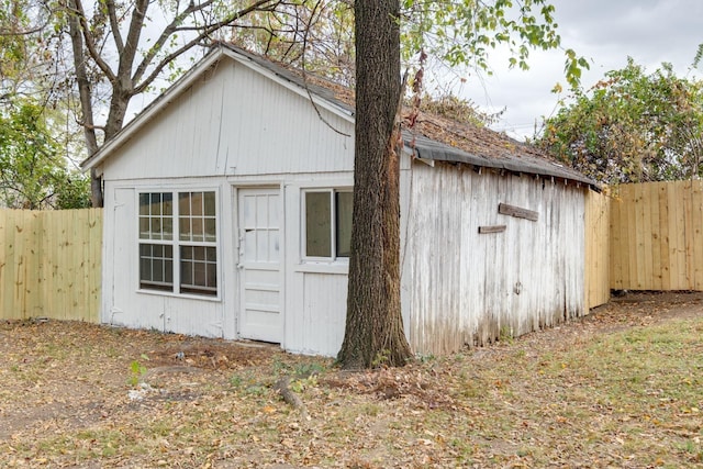 view of outbuilding with a fenced backyard