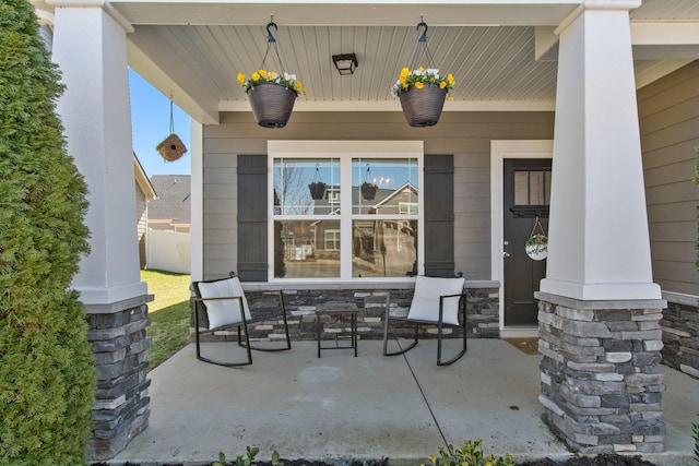 view of patio featuring a porch