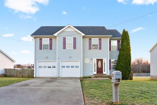 view of front of home with concrete driveway, roof with shingles, an attached garage, fence, and a front yard