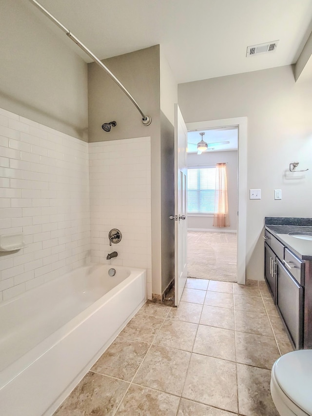 full bathroom featuring visible vents, toilet, shower / tub combination, tile patterned flooring, and vanity