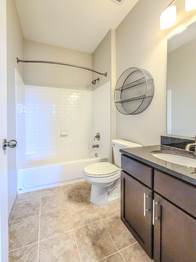 full bathroom with  shower combination, tile patterned flooring, vanity, and toilet