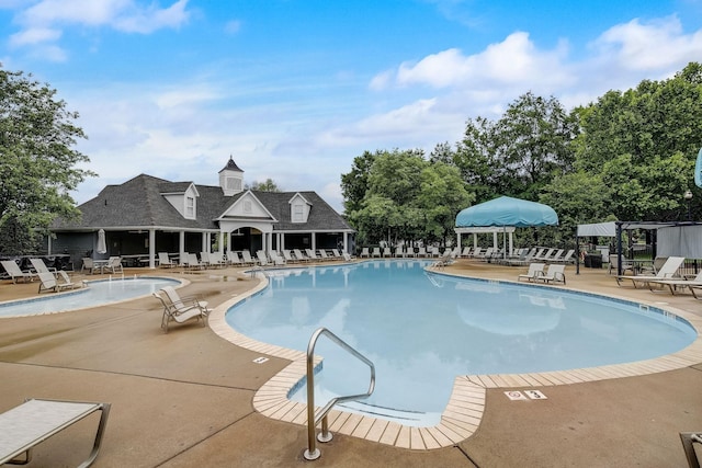 community pool with a patio