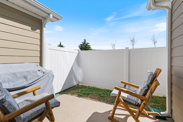 view of patio with a fenced backyard