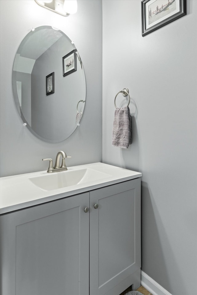 bathroom featuring vanity and baseboards