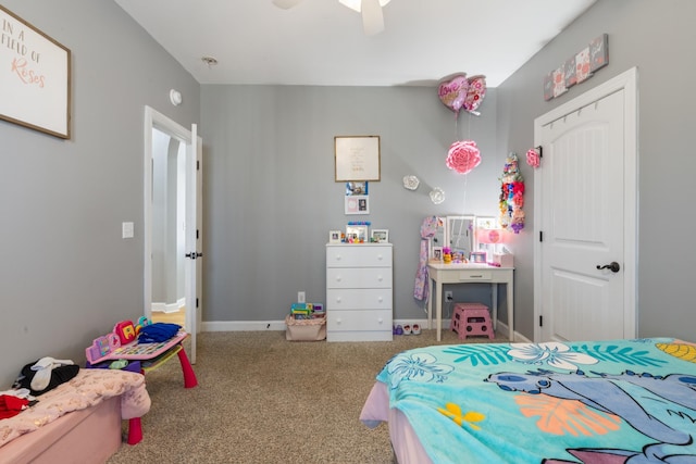 bedroom featuring carpet, a ceiling fan, and baseboards