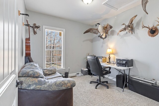 office area featuring a wealth of natural light, carpet, and attic access