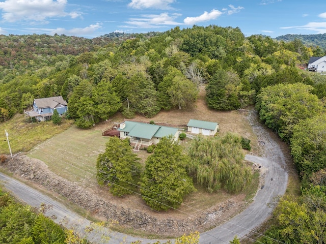 aerial view featuring a view of trees