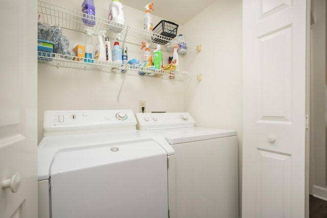 laundry area featuring washing machine and dryer and laundry area