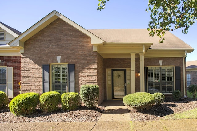 view of front of house with brick siding