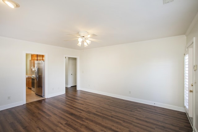 unfurnished bedroom with dark wood-style floors, ensuite bathroom, ornamental molding, freestanding refrigerator, and baseboards