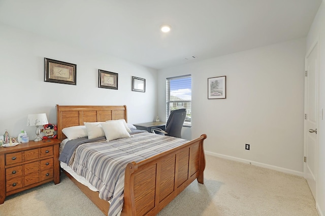 bedroom featuring recessed lighting, baseboards, and light colored carpet