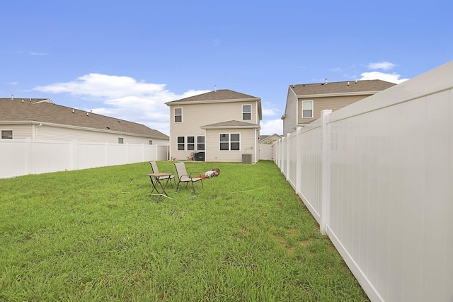 view of yard featuring a fenced backyard