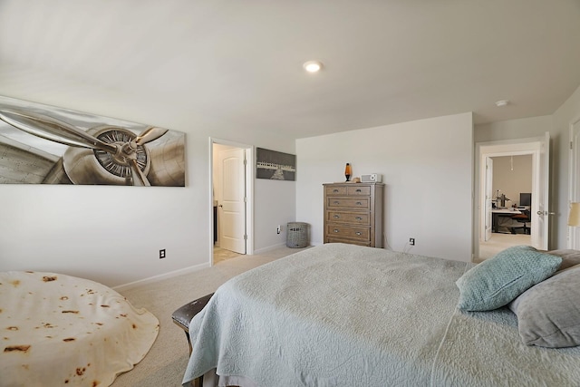 bedroom featuring carpet and baseboards