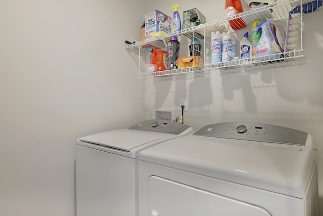 laundry area featuring laundry area and washing machine and dryer