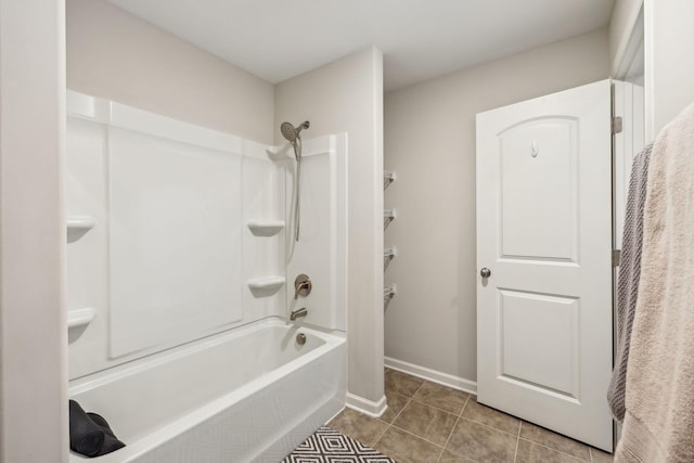 bathroom with  shower combination, baseboards, and tile patterned floors