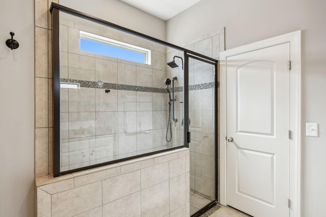 bathroom featuring a stall shower