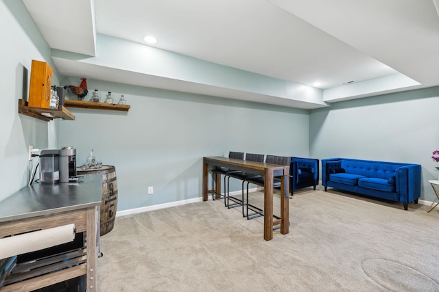 interior space with carpet floors, baseboards, and recessed lighting