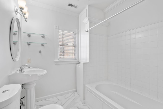 bathroom with marble finish floor, ornamental molding, toilet, and baseboards