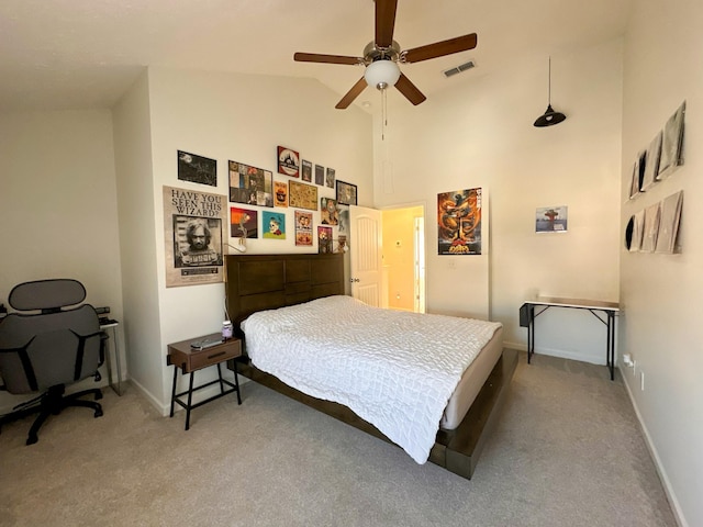 carpeted bedroom featuring high vaulted ceiling, visible vents, baseboards, and a ceiling fan