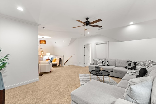 living area with lofted ceiling, recessed lighting, light colored carpet, visible vents, and baseboards