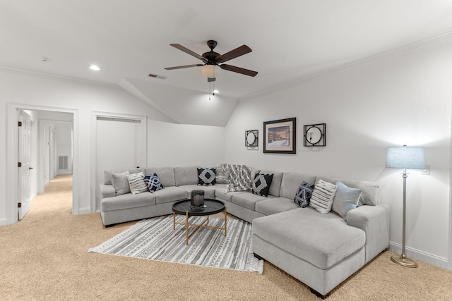 carpeted living room featuring lofted ceiling, a ceiling fan, visible vents, and crown molding