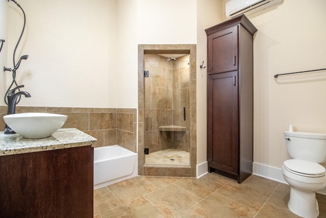 bathroom with a wall unit AC, toilet, baseboards, a bath, and a stall shower