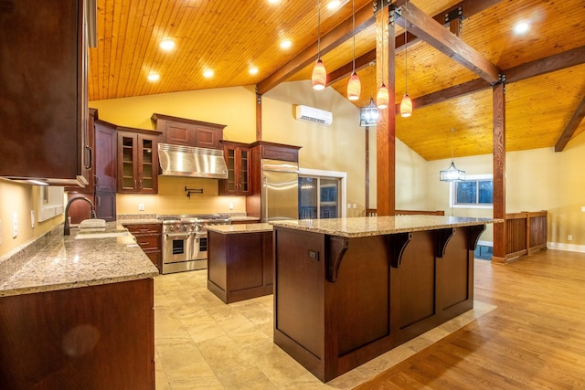 kitchen with wooden ceiling, high quality appliances, ventilation hood, a wall mounted AC, and a center island