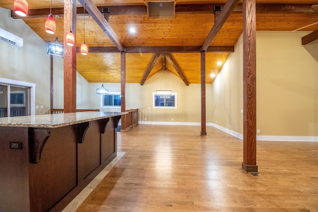 kitchen featuring light wood-type flooring, wood ceiling, and baseboards