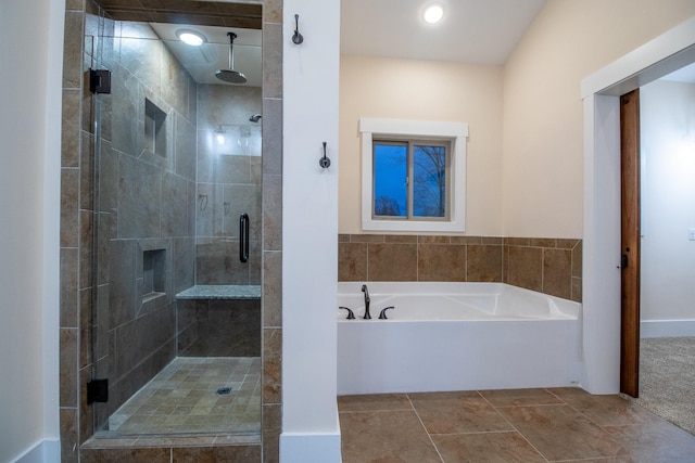 full bath with a shower stall and a bath