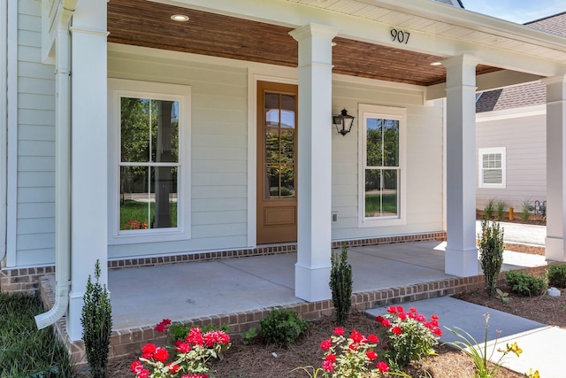 entrance to property with covered porch