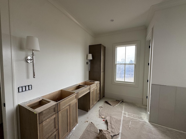 interior space with crown molding