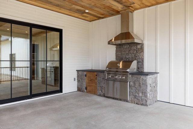view of patio with an outdoor kitchen and area for grilling