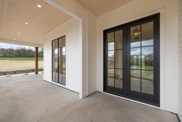 doorway to property featuring a patio area