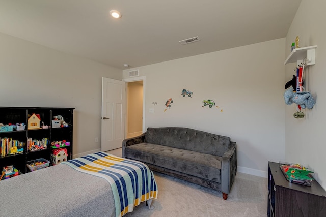 bedroom with carpet, visible vents, and baseboards