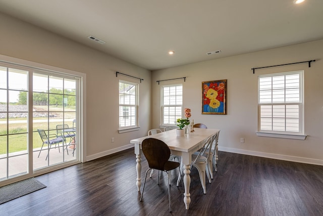 dining area featuring recessed lighting, dark wood finished floors, visible vents, and baseboards