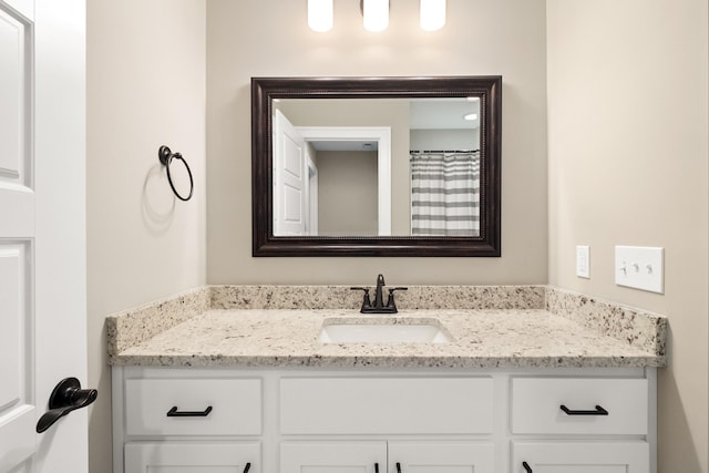 full bathroom featuring vanity