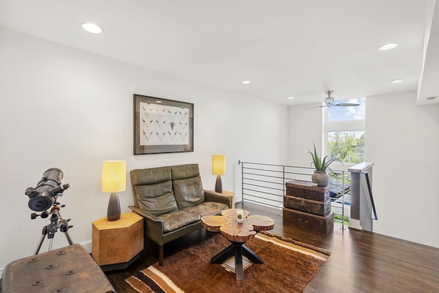 living area featuring a ceiling fan, wood finished floors, and recessed lighting