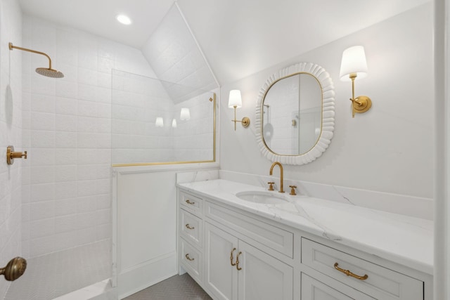 full bath with a walk in shower, vaulted ceiling, vanity, and recessed lighting