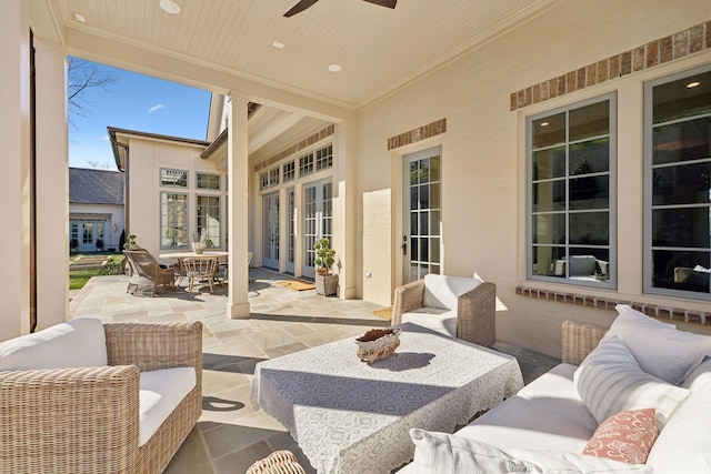 view of patio / terrace featuring a ceiling fan and outdoor lounge area