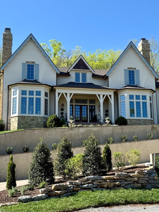 391 The Lady Of The Lake Ln, Franklin, TN 37067 - rear view of house featuring a chimney and stucco siding