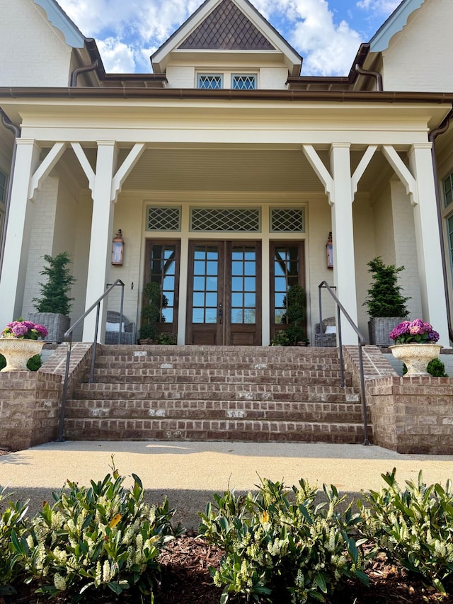 391 The Lady Of The Lake Ln, Franklin, TN 37067 - entrance to property featuring a porch and brick siding